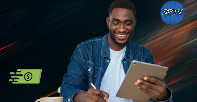 Young dark skin guy smiling and writing